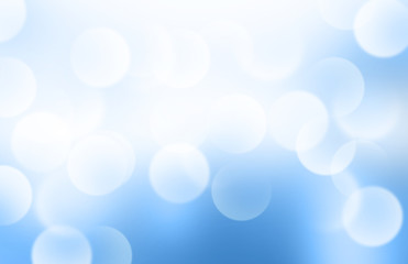 Lights or blurred bokeh on blue gradient background