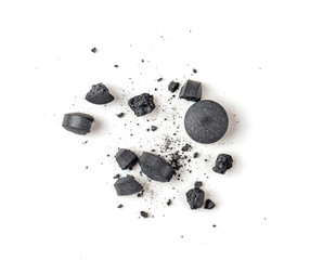 Activated charcoal powder isolated on white background.