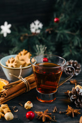 mulled brandy on wooden table . christmas concept