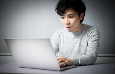 Young man using a laptop computer