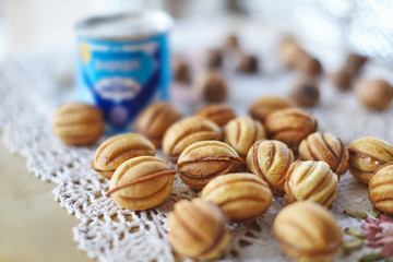 Traditional russian festive cookies in nut shape with caramelized milk inside