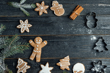 Christmas gingerbread cookies on wooden table with copy space