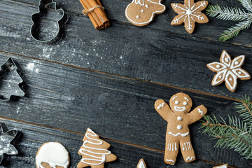 Christmas gingerbread cookies on wooden table with copy space