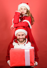 Christmas party. How to be santa claus parents guide. Belief in santa constitutes most magical part of childhood. My dad is santa claus. Girl little cute child and bearded father wear santa costume