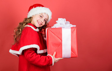 What is inside. Lets open christmas gift. Happiness and joy concept. Gifts delivery service. Small girl celebrate christmas. I am so excited. Girl cute child santa costume hold christmas gift box