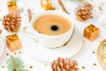 Creative natural layout of Christmas decorations with cups of coffee on a white background. Flat lay, Top view