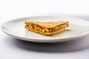 Paneer tikka Sandwich - is a popular Indian version of sandwich using cottage cheese curry with tomato ketchup, mint chutney
