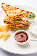 Paneer tikka Sandwich - is a popular Indian version of sandwich using cottage cheese curry with tomato ketchup, mint chutney