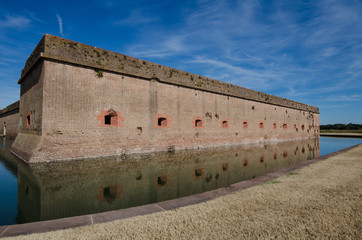 Bullet holes / cannon holes in the brick walls of Fort Pulaski National Monument in Georgia from the Civil War