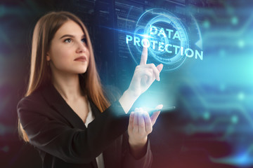 The concept of business, technology, the Internet and the network. A young entrepreneur working on a virtual screen of the future and sees the inscription: Data protection