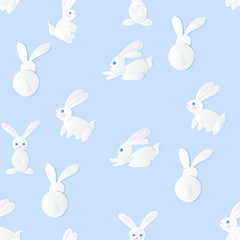 Modèle vectorielle continue avec des lapins de dessin animé blanc. Style d& 39 art du papier. Conception pour les enfants.