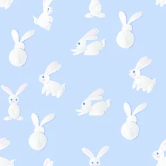  Naadloze vector patroon met witte cartoon konijnen. Papier kunststijl. Ontwerp voor kinderen. © zlata_titmouse