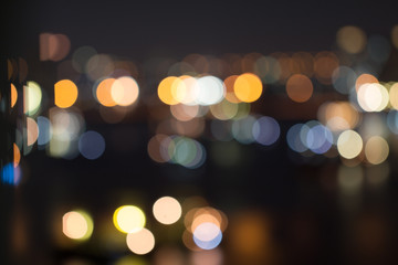 Obraz premium Defocused city night light blurred with bokeh abstract background.