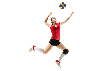 Female professional volleyball player isolated on white with ball. The athlete, exercise, action, sport, healthy lifestyle, training, fitness concept © master1305