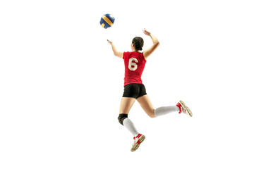 Female professional volleyball player isolated on white with ball. The athlete, exercise, action, sport, healthy lifestyle, training, fitness concept © master1305