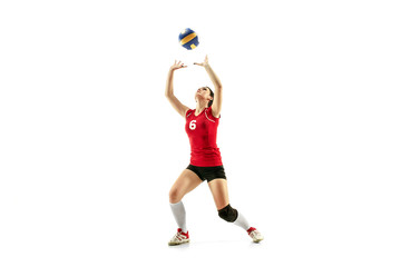 Female professional volleyball player isolated on white with ball. The athlete, exercise, action,...