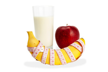 Yellow bananas, a glass of milk, a red apple, on a white background. Isolate
