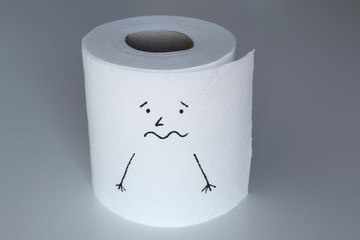 A white toilet paper roll sketched with a frightened character with scared face and arms down, representing the fear feeling through his face