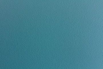 The cement wall is green, which makes it refreshing