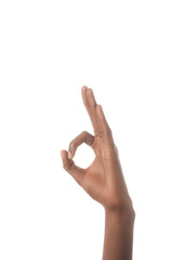 cropped view of african american man showing ok sign isolated on white
