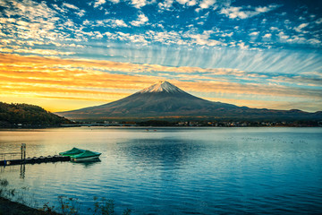 Mt. Fuji over Lake Kawaguchiko at sunrise in Fujikawaguchiko, Japan.