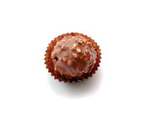 chocolate ball with nuts on white background