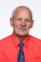 Handsome bearded senior man shows surprised grimace