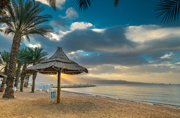 Morning on central public beach of Eilat - famous tourist resort and recreational city in Israel and Middle East