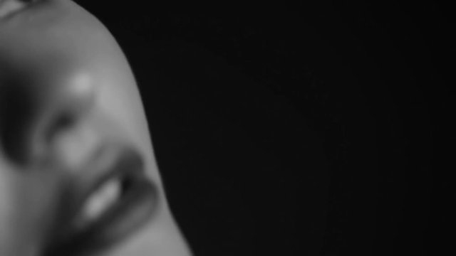 Passionate female lips close up. Black and white video.