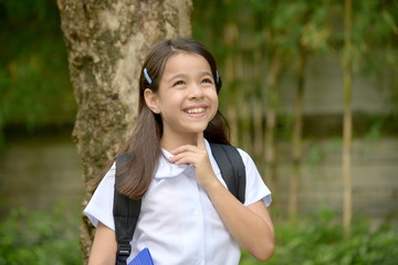 Minority Girl Student Making A Decision With Books