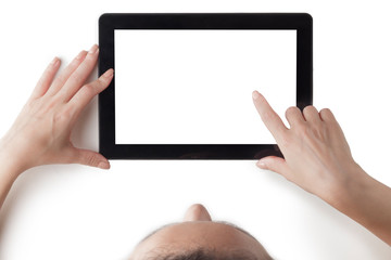 The woman is touching the empty screen