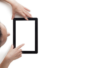 The woman is touching the empty screen