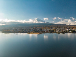 Aerial view over lake Kawaguchi, located in the border Fujikawaguchiko and Minobu, southern Yamanashi Prefecture near Mount Fuji, Japan. Lake Kawaguchi is a very popular tourist spot near Fuji Japan.