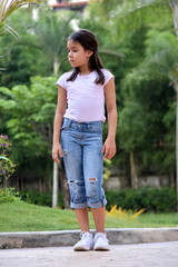 Fototapeta premium Serious Cute Diverse Person Standing