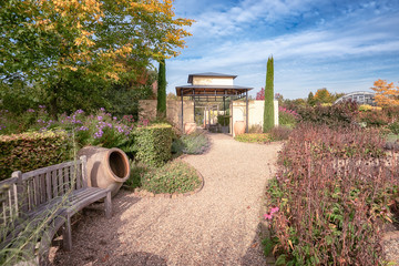 Architectural building in the beautiful autumn garden