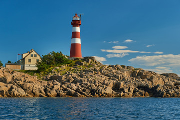 Travel in Norway.  Lighthouse on the Lofoten Islands. Norwegian nature. Scandinavian trip