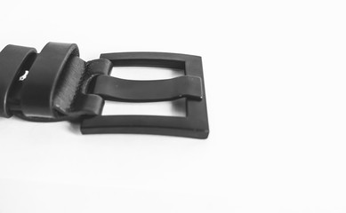 Black leather strap on white background