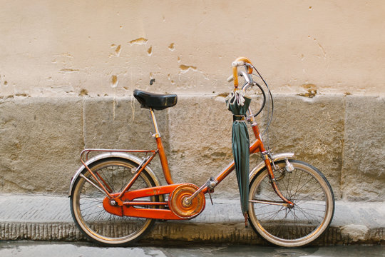 Orange Bicycle in Florence Alley