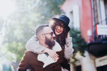 Two of friends on the street walking around having fun