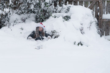 Tween Girl Playing in Snow