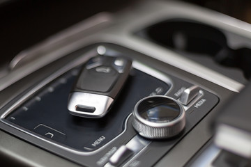 Key lies in the car on the touch panel control. Salon premium car with keyless access.