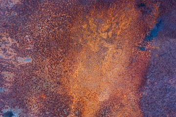 Bright texture of a rusty metal sheet surface.