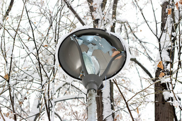 Lamp light post broken park snowfall vandalism