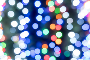 Christmas bokeh of blurry colored circles. horizontal photo format