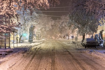 Fototapeta na wymiar rural village streets at snowy night
