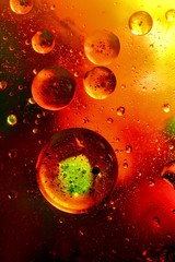 Abstract colorful Background Oil in Water surface Foam of Soap with Bubbles macro shot close-up