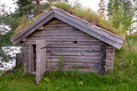 old barn with grass roof