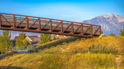 Fototapeta premium Bridge over a winding path in Scenic Daybreak Utah