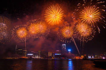 Hong Kong - 01 Februar, 2014: Fireworks at the celebration of the Chinese New Year .  Viewed from Hong Kong Island on Kowloon and Victoria Harbor