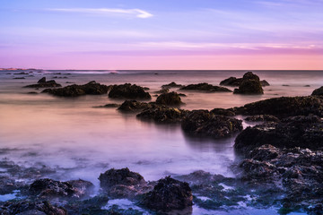 Tide pools at sunset; Pacific Ocean coastline, California; long exposure
